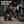 Motorcycle rider checking tyre pressure with a MotoPressor SmartPUMP cordless tyre inflator before a ride